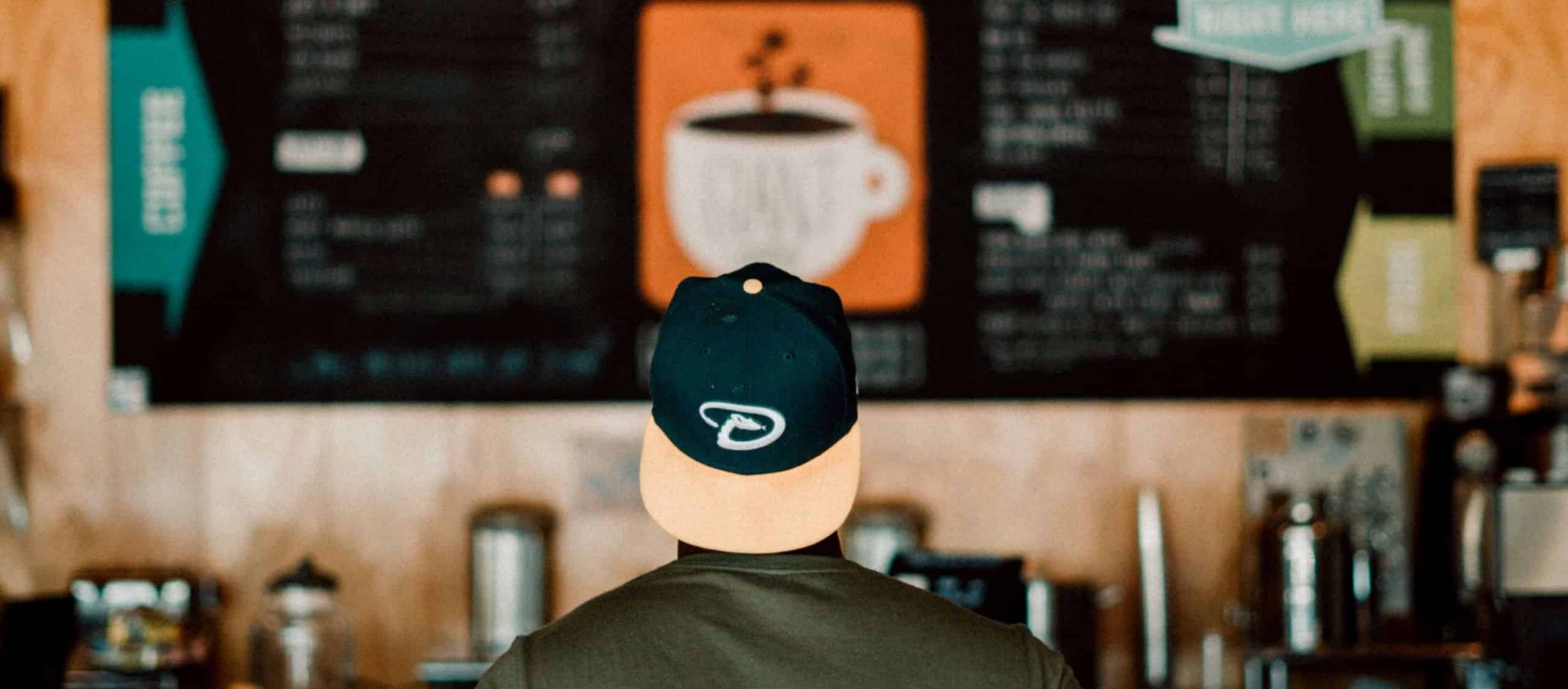 Person looking at a menu board